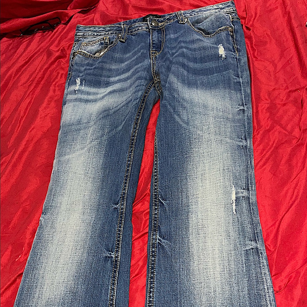 These are jeans from Express that are embellished with little designs.